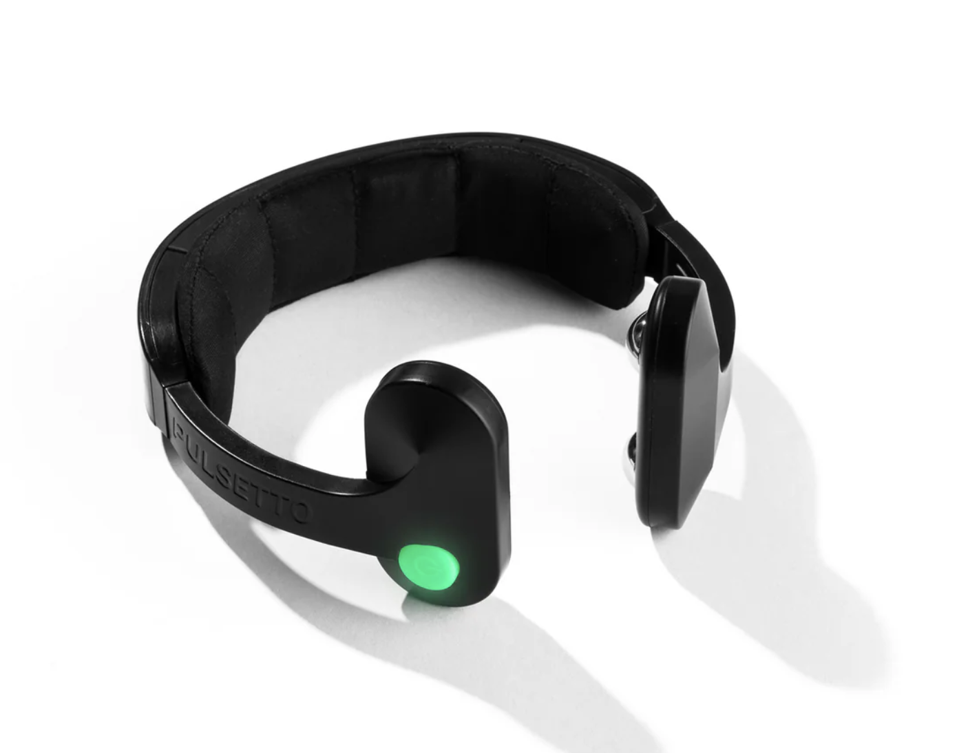 A picture of a Pulsetto Fit device against a blank background