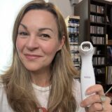 Clare Johnston holds a Nira laser device