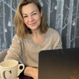 Journalist Clare Johnston pictured by her laptop