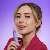 Dr. Shereene Idriss holds her Major Fade Serum.